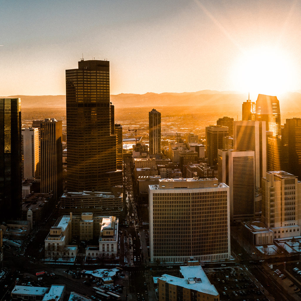 A beautiful drone photo of Denver Colorado skyline at sunset